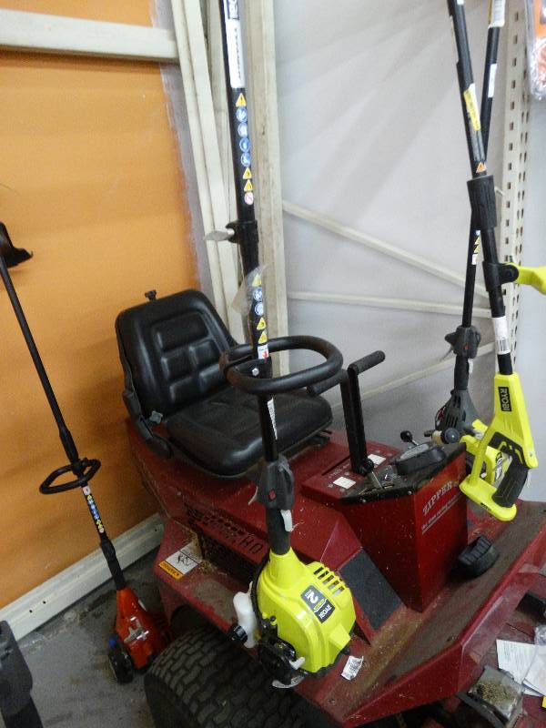 lot 229 image: Ryobi 2 Cycle 12000 RPM Gas Weed Eater.