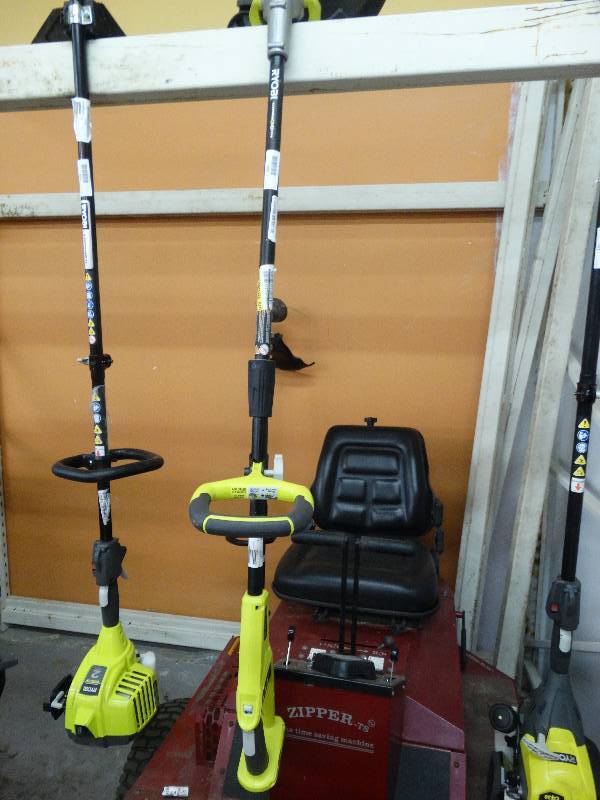 lot 230 image: Ryobi 13 Battery Weed Eater.