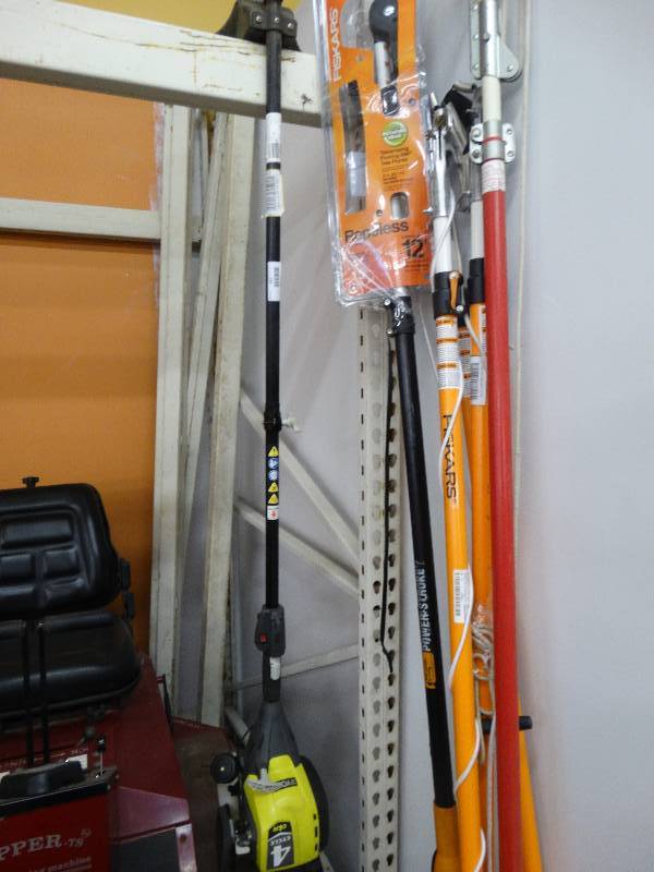 lot 231 image: Ryobi 4 Cycle Gas Weed Eater.