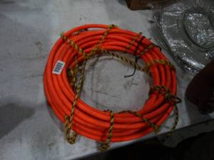 lot 1615 image: Orange Air Hose and Chuck