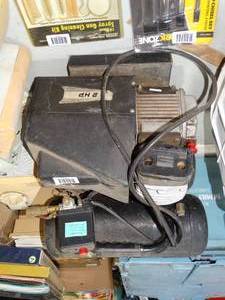 lot 1515 image: Portable Double Tank 2 HP Air Compressor