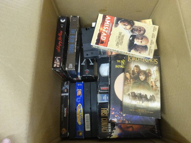 lot 903 image: Box Of VHS Movies.