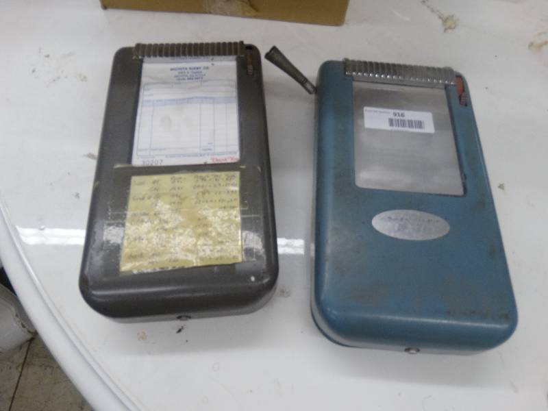 lot 916 image: 2 Old Receipt Dispenser.