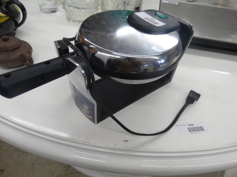 lot 922 image: Oster File Belgian Waffle Maker.