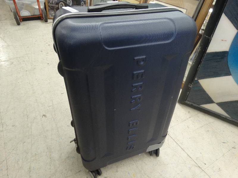 lot 1012 image: Big Perry Ellis Suit Case.