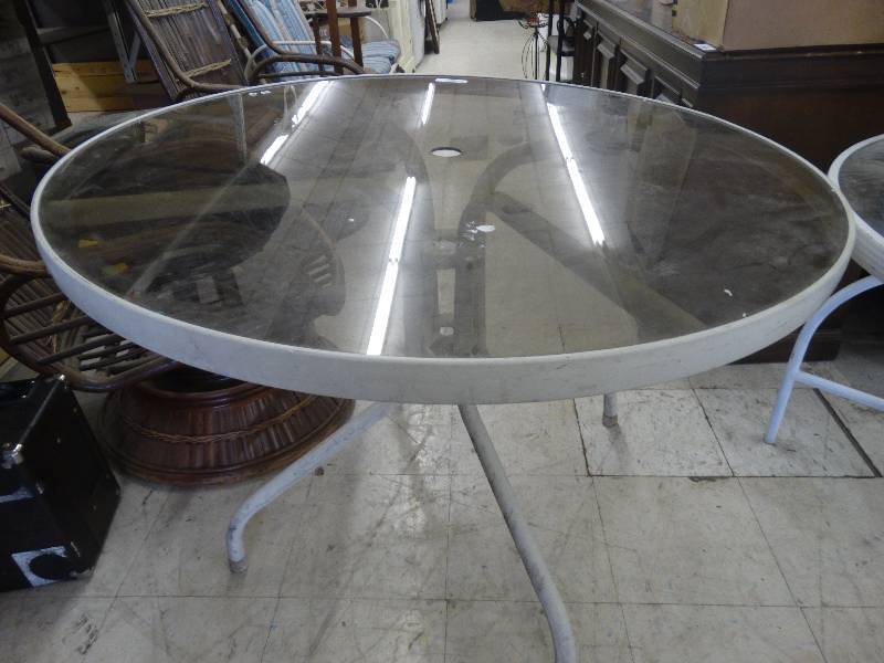 lot 1038 image: Circle Patio Table, Glass Top.