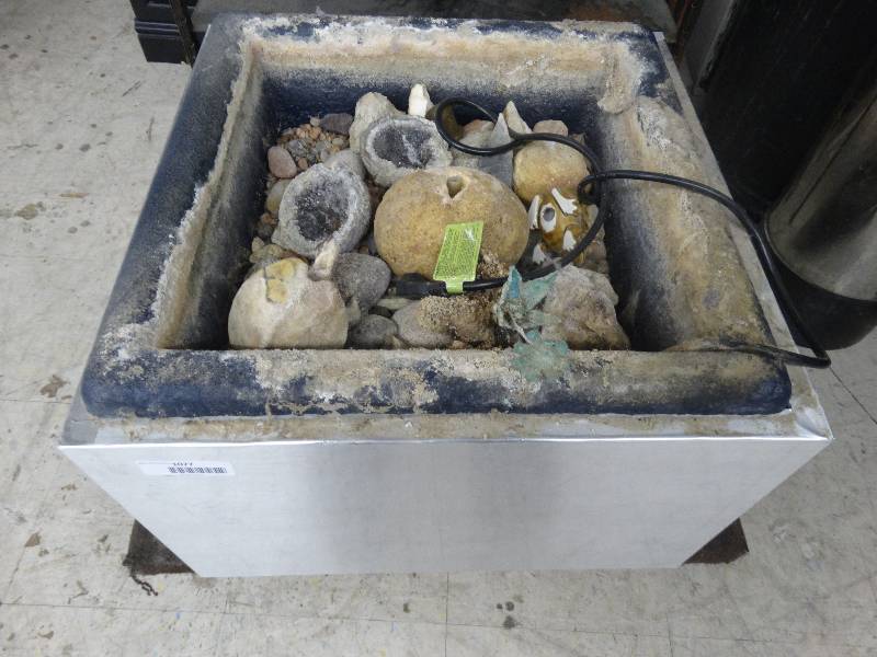 lot 1077 image: Water Fountain WRacks.