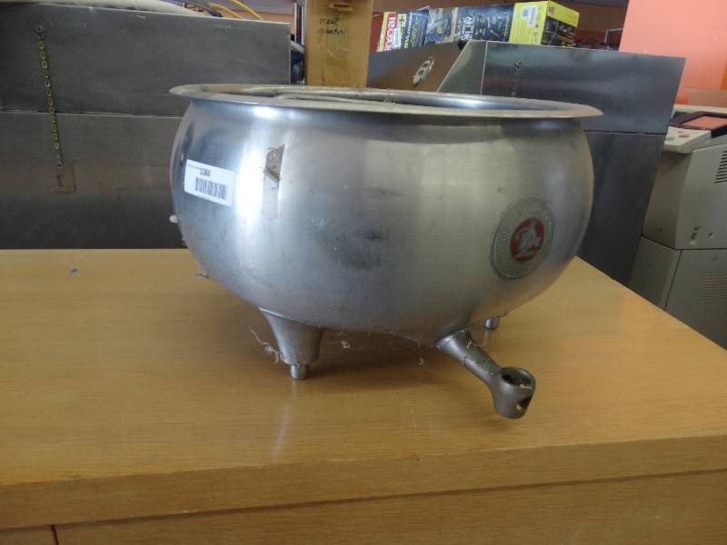 lot 1086 image: Parts Of Cream Separator.