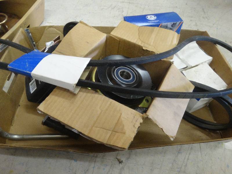 lot 1089 image: Pulley, Belts, Mower Parts.