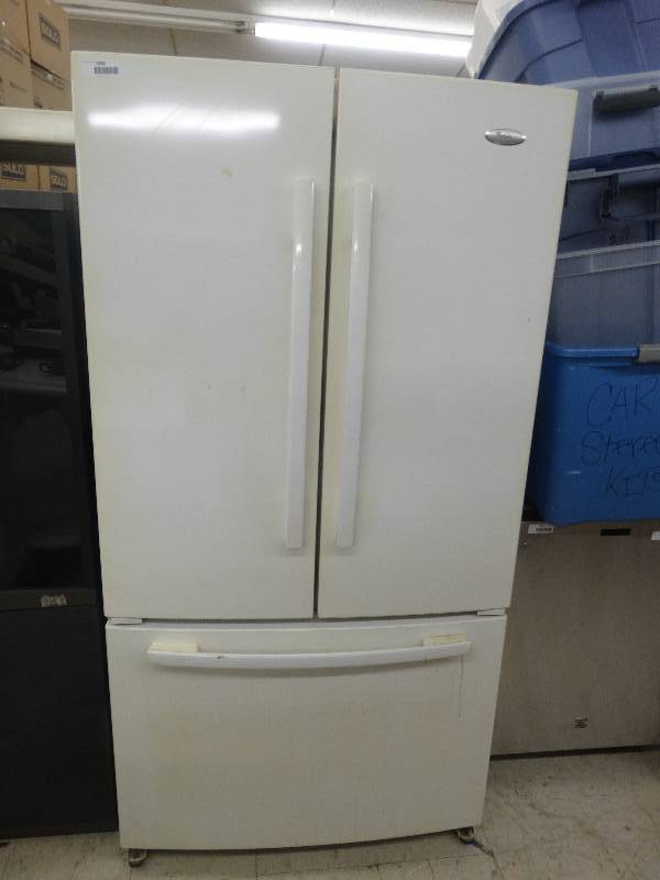 3 Door Whirlpool Gold Refrigerator. North Wichita Furniture/Tools