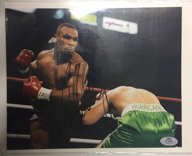 lot 1033 image: Signed Mike Tyson 8x10 Photograph in Bold Black Ink with ACE Certification