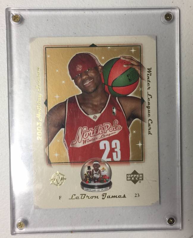 lot 1084 image: Three 2003-04 LeBron James Rookie Cards UD Black Diamond, Platinum Big Ticket, UD Winter League Card
