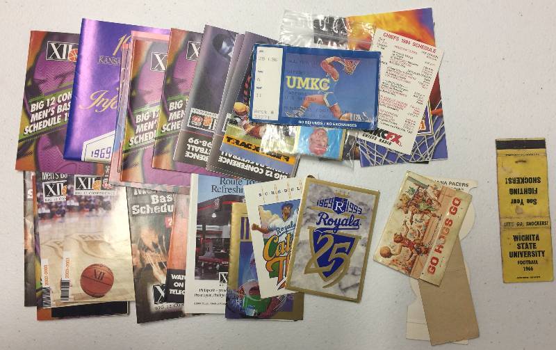 lot 1087 image: Huge Lot of Pocket Schedules Kansas City Royals, Chiefs, KU Jayhawks 1966 Wichita Shockers Matchbook