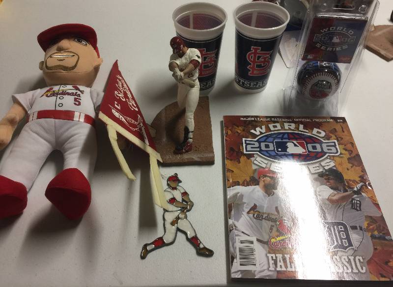 lot 1114 image: Lot of St. Louis Cardinals Memorablia with World Series Program, Mark McGwire pieces, Mini Pennants  more