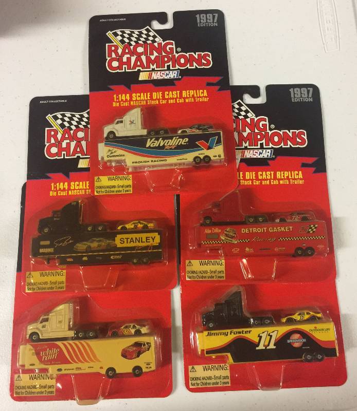 lot 1159 image: 15 FIFTEEN 1997 Edition Racing Champions NASCAR 1144 Diecast Truck & Trailer