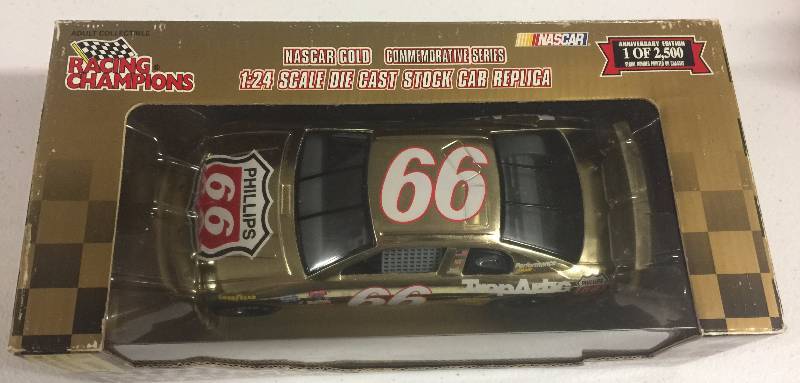 lot 1165 image: 1998 Racing Champions 124 Diecast Stock Car Replica GOLD 1 of 2,500 #66