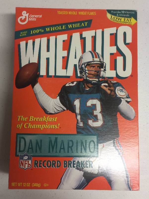 lot 1182 image: Unopened Wheaties Box Dan Marino Record Breaker with Cereal Still in Box