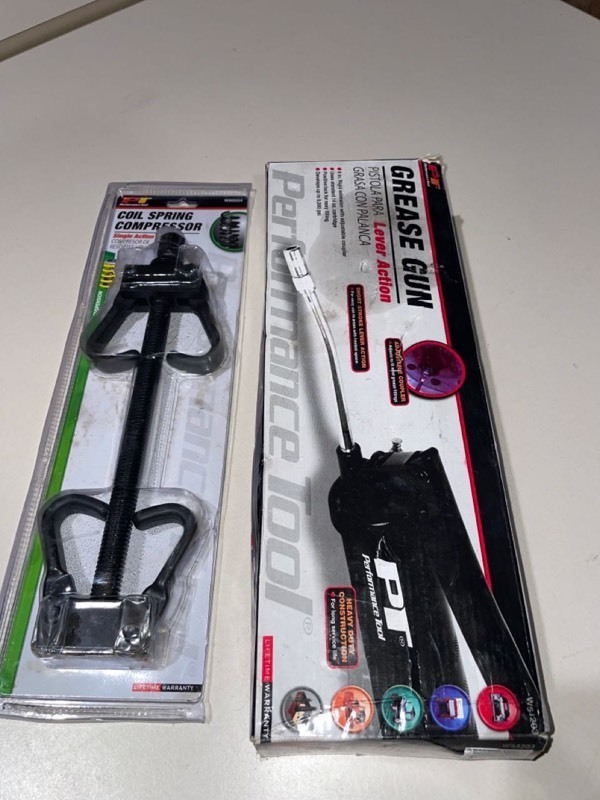 lot 1427 image: Performance Tool W80554 Coil Spring Compressor, Grease Gun W54203