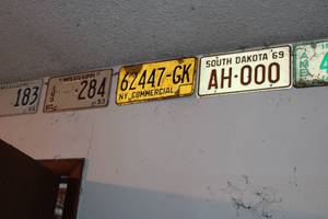 lot 18039 image: Lot of Hearse Auto Tags