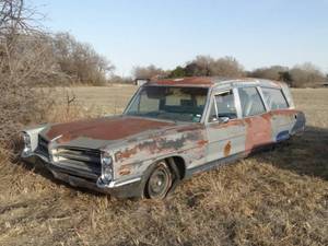 lot 11016 image: 1960s Pontiac Bonneville Hearse  Classic Car  Fold-Away Seats