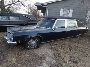lot 11029 image: WOW  Look  Oldsmobile Rocket 455 in an Awesome 1973 Oldsmobile Hearse 