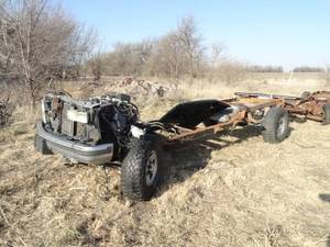 lot 11057 image: One Truck Frame  Motor  Wheels  Etc