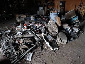 lot 11114 image: Large Pile of Misc Auto Parts on Floor  in East 12 of West Barn