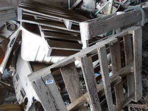 lot 11164 image: Large Tub of Automotive Parts and a few Wood Pallets     West 12 of West Barn