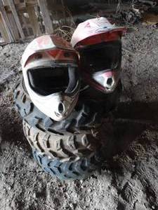 lot 11168 image: Three 25 x 8.0 - 12 Tires  Wheels  2 Offroad Helmets    West 12 of West Barn