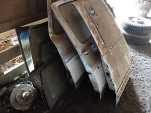 lot 11176 image: Lot of 2 Square Body Doors w White Chevrolet 1500 Door    West 12 of West Barn