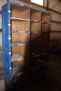 lot 18081 image: Blue Cubical Cabinet