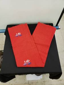lot 8201 image: Hand sewn red tablecloth