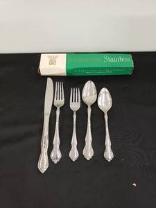 lot 8243 image: International Stainless silverware setting