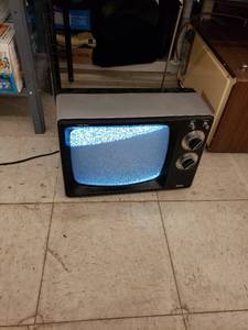 lot 8320 image: old RCA small TV powers on