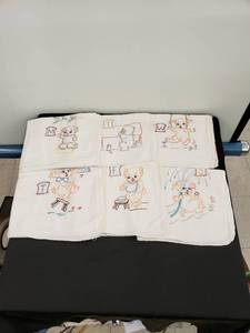 lot 8442 image: lot of hand stitched tea towels