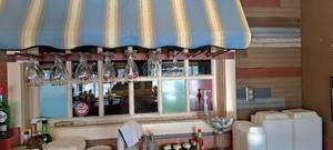 lot 32393 image: 11 Stella Artois Glasses with Rack