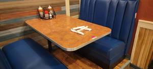 lot 49561 image: Wall Mount Laminated Top Chrome Trim Dining Table