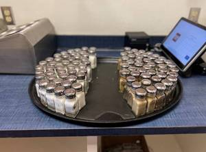 lot 9492 image: Lot of Salt amd Pepper Shakers W a Black Round Serving Tray