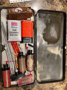 lot 20 image: gun cleaning kit.