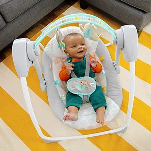 lot 60588 image: Bright Starts Whimsical Wild Portable Compact Automatic Deluxe Baby Swing with Music and Taggies, Newborn and up
