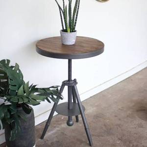 lot 64250 image: Round Wood and Adjustable Metal Side Table MSRP $380