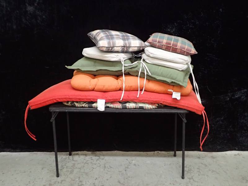 lot 1046 image: Padded Table with Folding Legs and Cushions, Cushions, Cushions