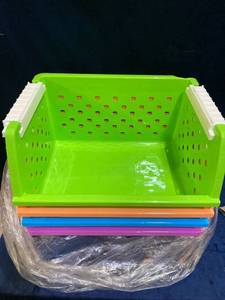 lot 35526 image: 4 STACKABLE MULTI COLOR PLASTIC BINS ONE CRACKED