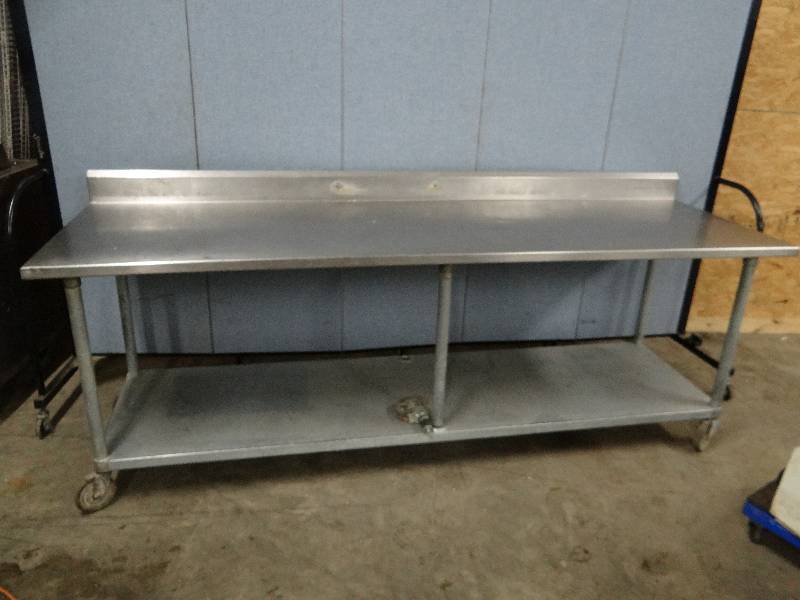 lot 2301 image: Stainless Top work Table w Galvanized Under shelf on Casters