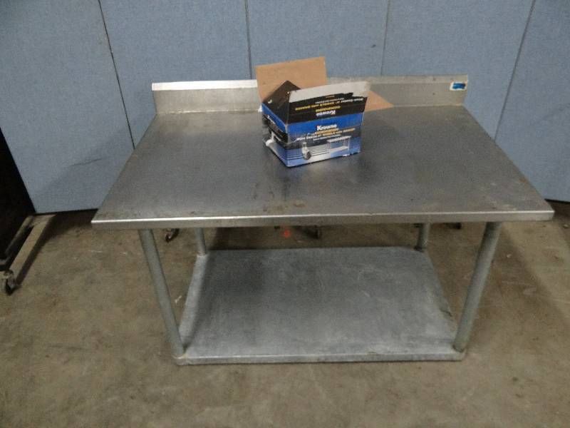 lot 2318 image: Stainless 48 Work top Table w Galvanized under Shelf