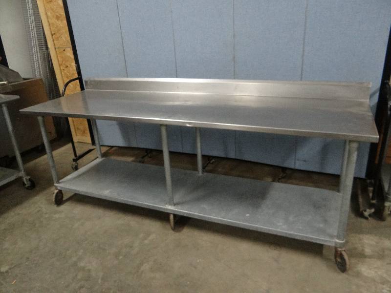 lot 2322 image: 96 Stainless Top Work Table w Galvanized Under Shelf on Casters