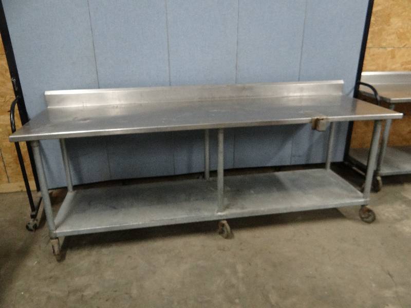 lot 2324 image: Stainless Top 96 Work Table w 5 Back Splash on Casters