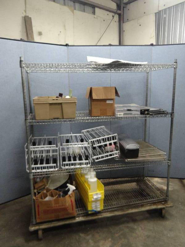 lot 2446 image: (4) Tier Wire Metal Metro Rack W Assorted Contents