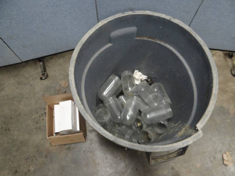 lot 2457 image: Rubbermaid Trash Bin 13 rd Full of  HoodWalk in Light Globes