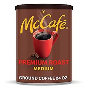 lot 154 image: McCaf� Premium Medium Roast Ground Coffee (24 oz Canister) (B07CZW2CG5)